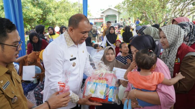 Tinjau Posyandu, Pj. Bupati Langkat : Pemerintah Peduli, Jangan Lelah Mencintai Negeri & Masyarakat.