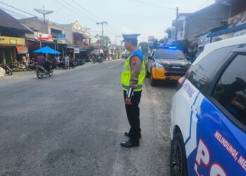 Polres Simalungun Sukses Amankan Lalu Lintas Saat Libur Kenaikan Isa Almasih.