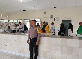 Sukseskan Program Pemerintah, Polsek Sintar Martoba Laksanakan Pengamanan Penyaluran Cadangan Pangan Kepada Masyarakat.