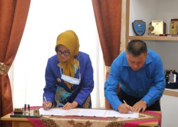 Wali Kota dr. Susanti Dewani SpA Tandatangani kesepakatan Bersama Antara Pemko Pematangsianțar Dengan Universitas Pembangunan Panca Budi & Universitas Murni Teguh.