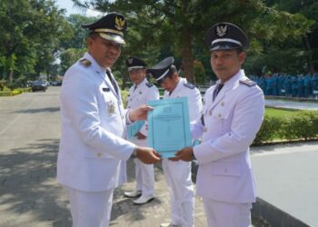 Pj Bupati Langkat Kukuhkan Perpanjangan Masa Jabatan 163 Kepala Desa : Semangat Kolaborasi Ditunjukkan Dengan Jalan Kaki Bersama.