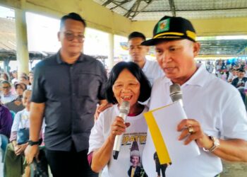 Giat Marharoan Bolon Di Kecamatan Raya Dipusatkan di Kelurahan Merek Raya.
