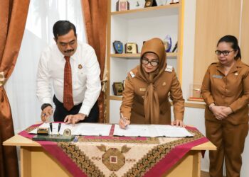 Wali Kota Pematangsiantar dr Susanti Dewayani SpA &  Kajari Pematangsiantar Jurist Pricesely SH MH Tandatangani Nota Kesepakatan Terkait Penanganan Masalah Hukum Bidang Perdata dan Tata Usaha Negara.