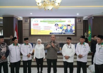 Pj Bupati Langkat Salurkan Bantuan Baznas Senilai Rp 221 Juta Untuk Masyarakat Yang Membutuhkan.