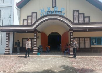 Polsek Perdagangan Gelar Patroli dan Monitoring Ibadah Minggu di Gereja-Gereja untuk Ciptakan Keamanan dan Kenyamanan.