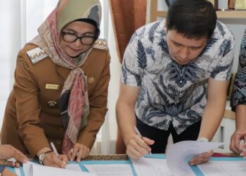 Wali Kota dr. Susanti & PT Suriatama Mahkota Kencana Tandatangani Serah Terima Pertama GOR Kota Pematangsiantar .