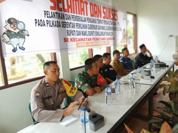 Bhabinkamtibmas Polsek Perdagangan Hadiri Pelantikan Pengawas TPS, Sampaikan Pesan Kamtibmas untuk Pemilu Damai di Kecamatan Pem Bandar.