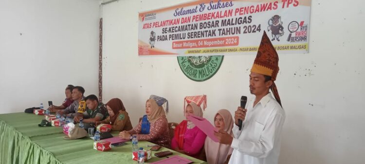 Polsek Bosar Maligas Hadiri Pelantikan Pengawas TPS, Tegaskan Pentingnya Netralitas dalam Pilkada Serentak 2024.