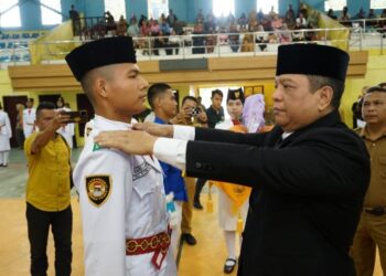 Pj. Walikota Tebingtinggi Kukuhkan  Paskibraka & Korps Musik.