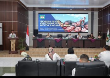Wali Kota Diwakili Plh Sekretaris Daerah (Sekda) Junaedi Sitanggang SSTP MSi Hadiri Acara Sosialisasi Optimalisasi Kota Layak Anak (KLA) Kota Pematang Siantar.