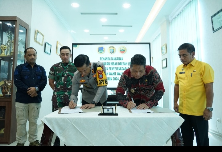Pemko & Polres Tanda Tangani Naskah Pengamanan Pilkada.
