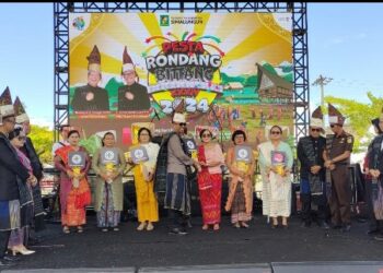Polres Simalungun Amankan Pesta Rondang Bittang Ke - 34 Tahun 2024 di Halaman Kantor Bupati Simalungun.