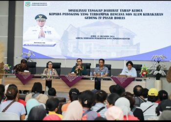 Pjs Wali Kota Hadiri Silaturahmi & Sosialisasi Tanggap Darurat Tahap II Kepada Pedagang Korban dan Terdampak Kebakaran Gedung IV Pasar Horas, di Gedung Serbaguna Pemko Pematangsiantar.
