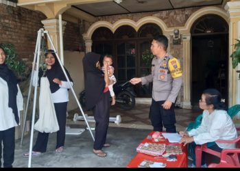 Sambang Ke di Posyandu Bahagia Bhabinkamtibmas Polsek Siantar Utara Sampaikan Pesan Kamtibmas.