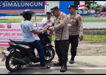 Kapolres Simalungun Wujudkan Semangat Nasionalisme, Gelar Pembagian 2.500 Bendera Merah Putih untuk Semarakkan HUT RI Ke - 80.