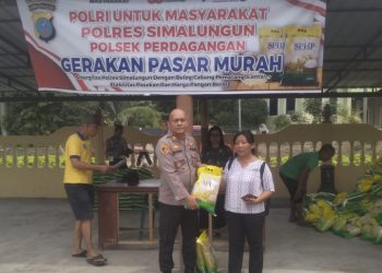 Polsek Perdagangan Gelar Pasar Murah, Salurkan 15 Ton Beras SPHP Untuk Masyarakat Simalungun.