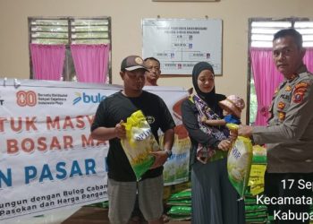 Polsek Bosar Maligas Gelar Pasar Murah Polri–Bulog, Stabilkan Harga Beras & Bantu Masyarakat Simalungun.