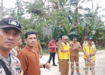 Polsek Bosar Maligas Amankan Kunjungan Kerja Bupati Simalungun di Kecamatan Ujung Padang.