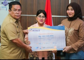 Wali Kota Pematangsiantar Wesly Silalahi, SH, MKn & Pimpinan Perbankan Serahkan Kredit Usaha Rakyat (KUR) Secara Simbolis Kepada Para Pelaku UMKM.