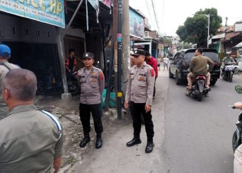 Polres Pematangsiantar Amankan Pembongkaran Bangunan di DAS Jalan Jawa.
