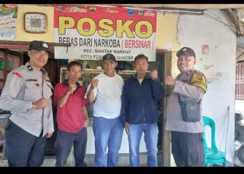 Bhabinkamtibmas Polsek Siantar Marihat Patroli Sampaikan Pesan pesan Kamtibmas.