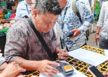 Perusahaan Daerah Pasar Horas Jaya (PD PHJ) Kota Pematangsiantar Menggunakan Aplikasi Pembayaran Non Tunai Berbasis Quick Response Code Indonesian Standard (QRIS).