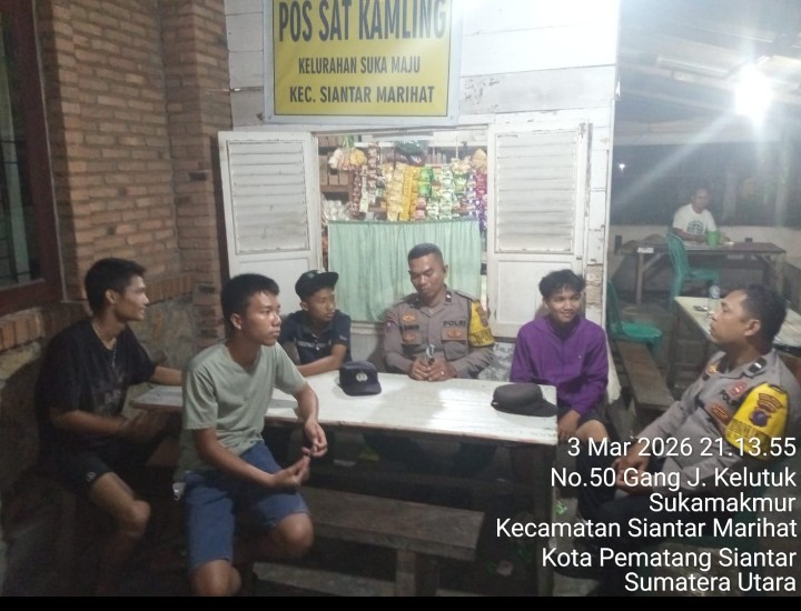 Samapaikan Pesan Kamtibmas Polsek Siantar Marihat Laksanakan Saling di Pos Kamling Jalan Durian.