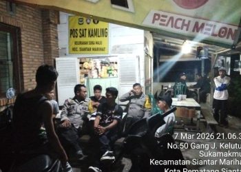 Bhabinkamtibmas Polsek Siantar Marihat Saling di Pos Kamling Jalan Durian.