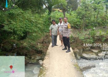 Bhabinkamtibmas Polsek Siantar Martoba Monitoring Survey Proyek Jembatan di Jalan Rindung.