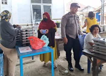 Bhabinkamtibmas Polsek Siantar Marihat Monitoring Distribusi MBG di Posyandu Simarimbun.