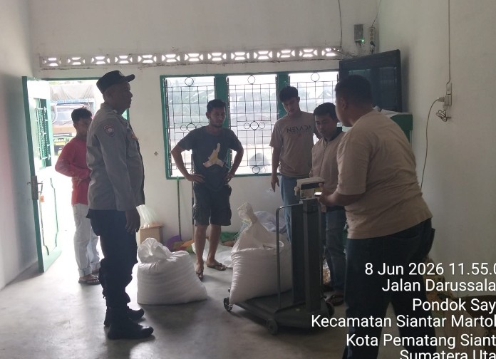 Polsek Siantar Barat Dampingi Penjualan Hasil Panen Jagung Petani Binaan ke Bulog.
