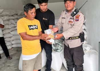 Polsek Siantar Selatan Dampingi Penjualan Hasil Panen Jagung Petani Binaan ke Bulog Cabang Pematangsiantar.
