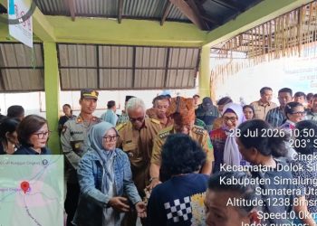 Kapolsek Dolok Silau Amankan Kunjungan Kerja Bupati Simalungun di Nagori Cingkes, Pelayanan Publik & Aspirasi Warga Berjalan Kondusif.