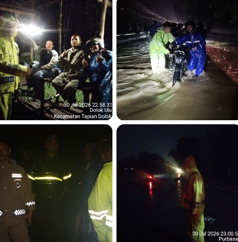 Sigap, Polsek Dolok Batu Nanggar Terjun Langsung Bantu Evakuasi Korban Banjir Luapan Sungai Sikam, 150 Rumah Warga Terdampak.