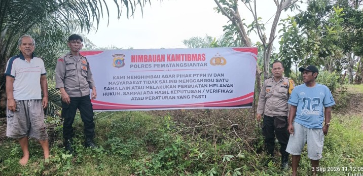Polsek Siantar Martoba Pemasangan Spanduk Himbauan Kamtibmas di Gurilla.