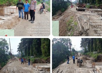 Berikan Pengamanan Progres Pembangunan Jembatan Pasca Longsor, Polsek Dolok Silau Dukung Pemulihan Infrastruktur Jalan Kabupaten.