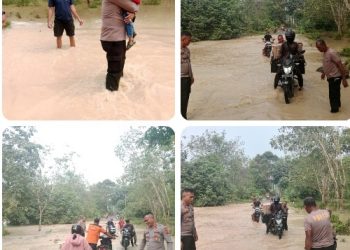 Banjir Genangi Jalan Bosar Maligas, Kapolsek & Personel Turun Langsung Bantu Warga Menyeberang.