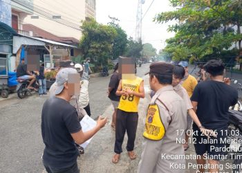 Polsek Siantar Timur Respons Laporan 110, Mediasi Perselisihan Parkir di Suzuya Mall.