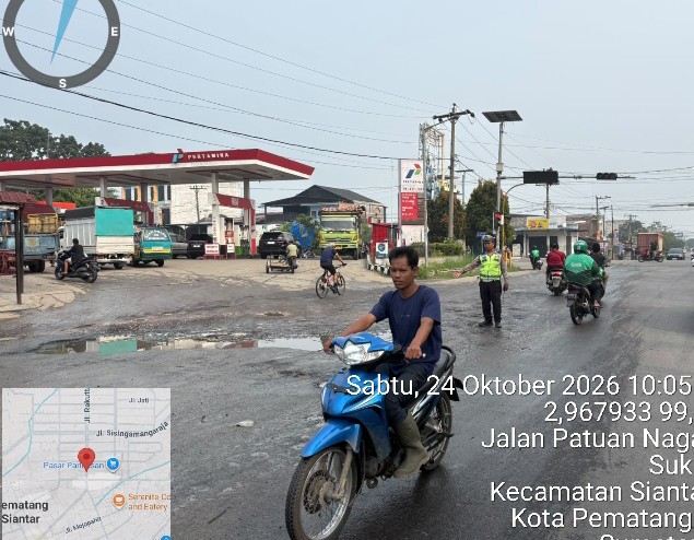Sat Lantas Polres Pematangsiantar Survey Jalan Rusak di Jalan Patuan Nagari.